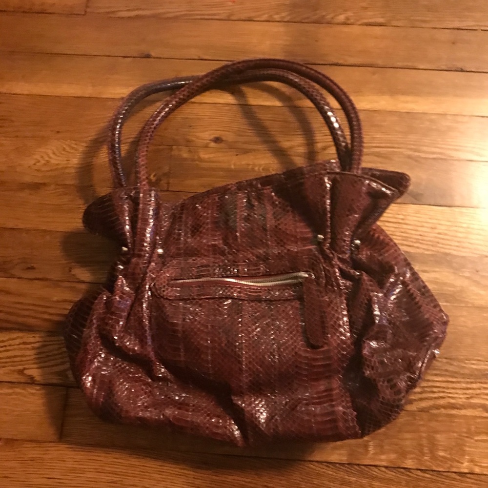 Pure collection leather handbag (maroon color)